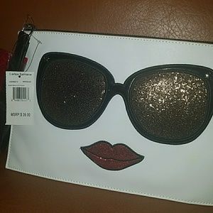 Carlos Santana Eyes Have It Large Clutch